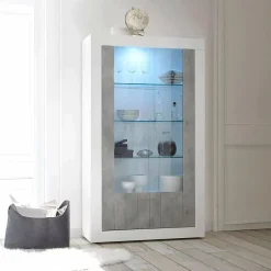 Mobile vetrina moderno 2 ante 110x42x190h cm bianco lucido e cemento - Alabama